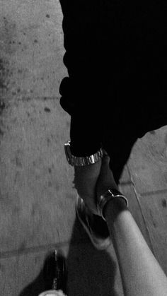 Couple holding hands at night